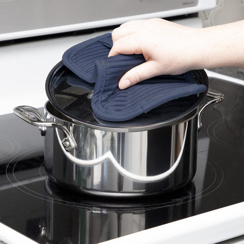 All-Clad indigo pot holder doubles as hot pad and makeshift oven mitt.