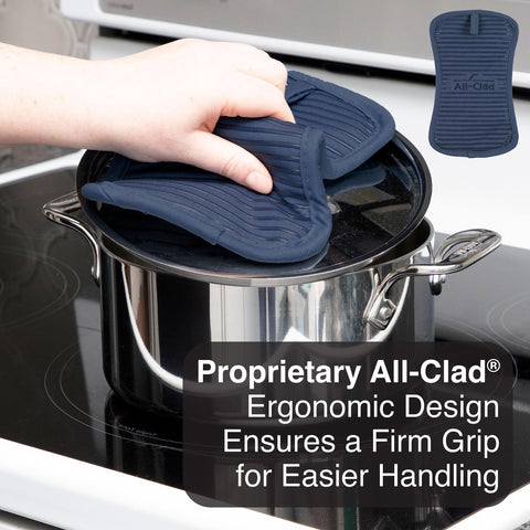 Machine washable All-Clad indigo pot holder for easy cleanup after cooking sessions.
