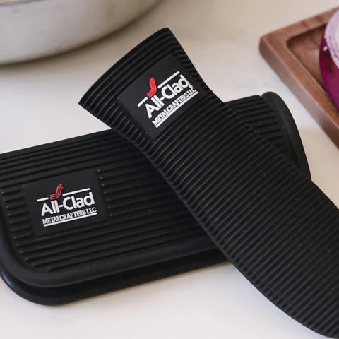 All-Clad grip set provides universal fit on most cookware handles.