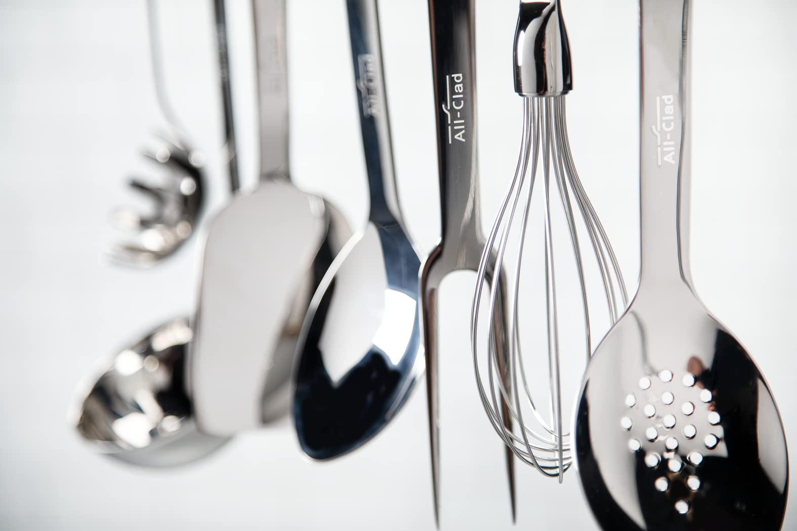 All-Clad slotted turner made with polished 18/10 stainless steel for durability.
