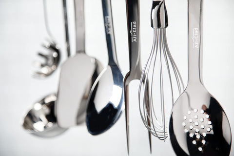 All-Clad slotted turner made with polished 18/10 stainless steel for durability.