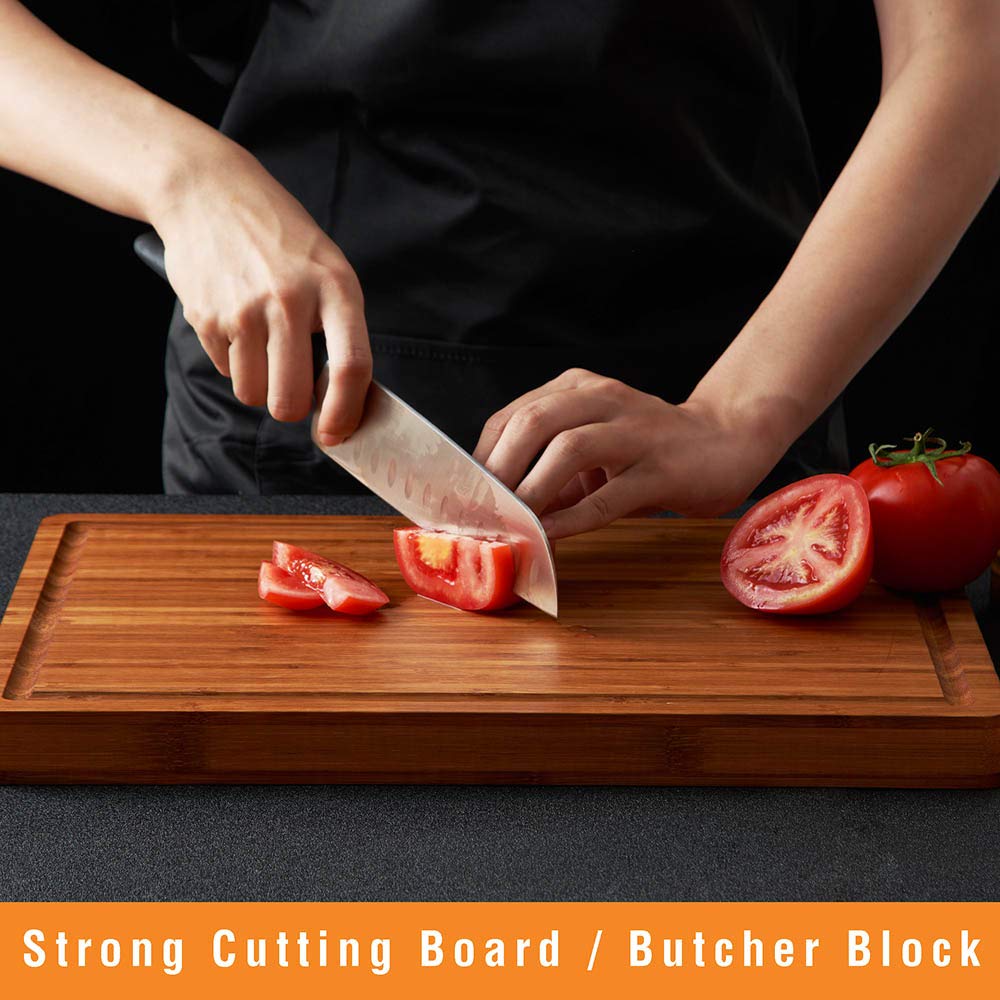 Allsum cutting board with juice grooves catches liquids and protects countertops.