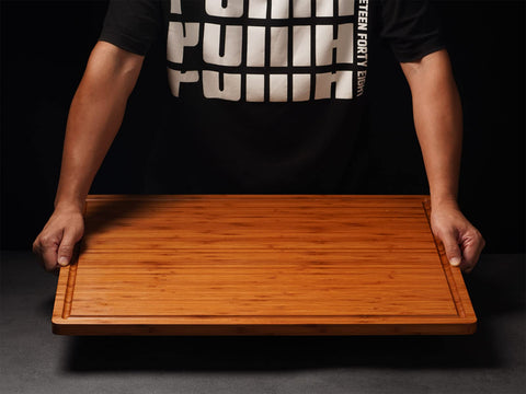 Allsum bamboo board with handles and juice grooves for easy serving