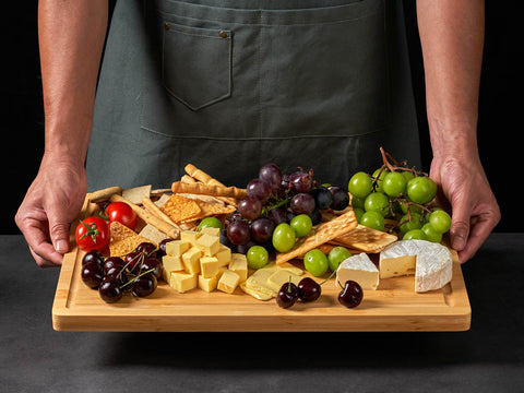 Allsum bamboo board provides a knife-friendly surface that resists dulling.