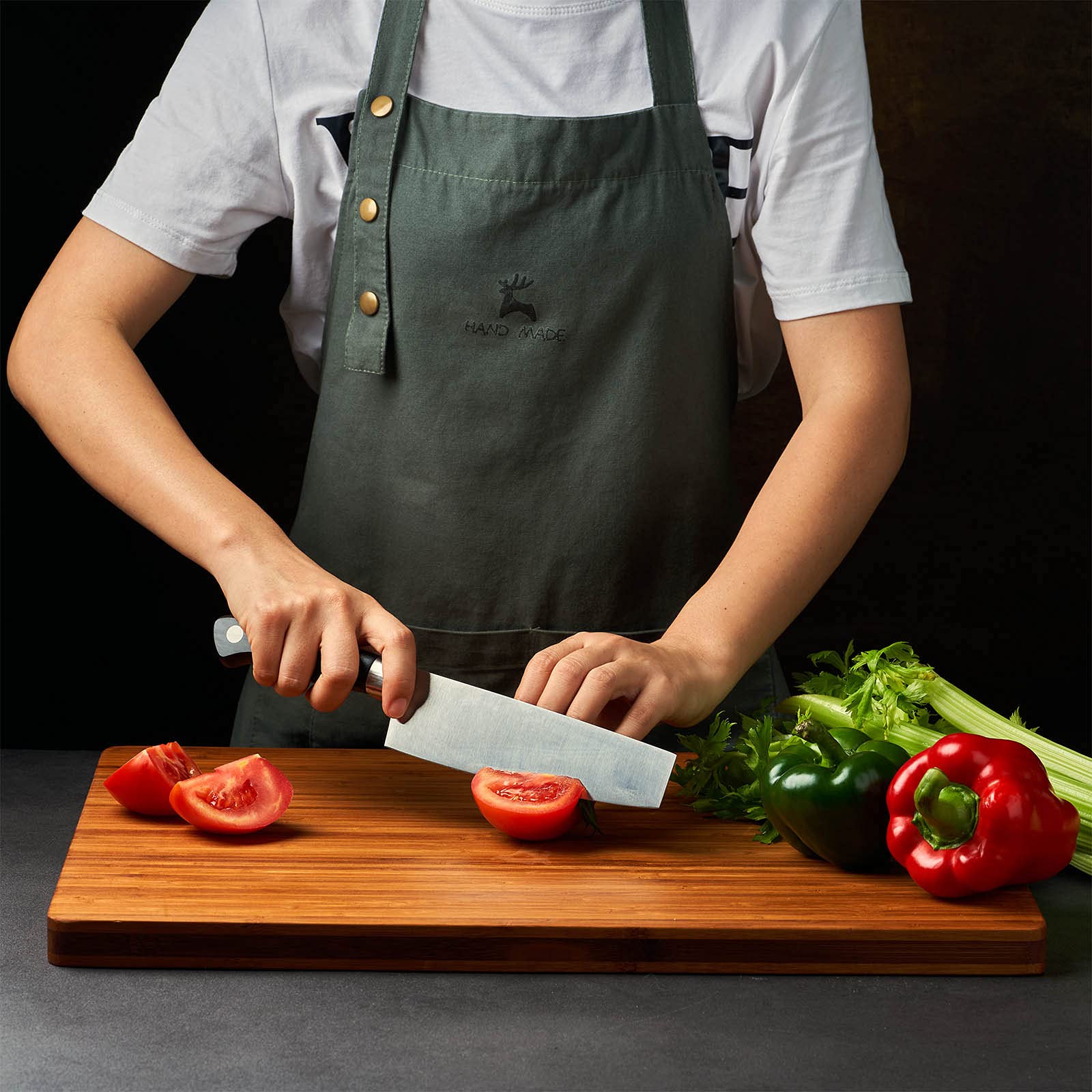 Allsum bamboo cutting board side handles for easy transport and serving.