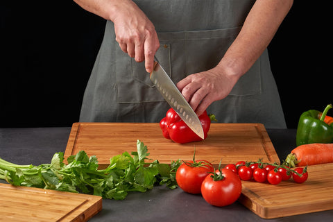Allsum board featuring hidden handles for comfortable grip while slicing.