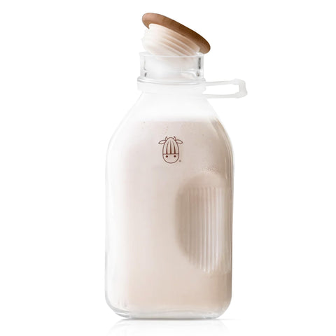 Almond Cow glass pitcher with lid and spout for spill-free pouring and storage