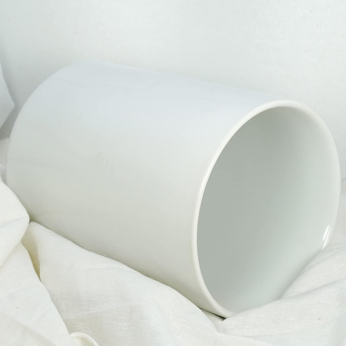 ALYC white ceramic jar on kitchen shelf complements modern décor while remaining practical.