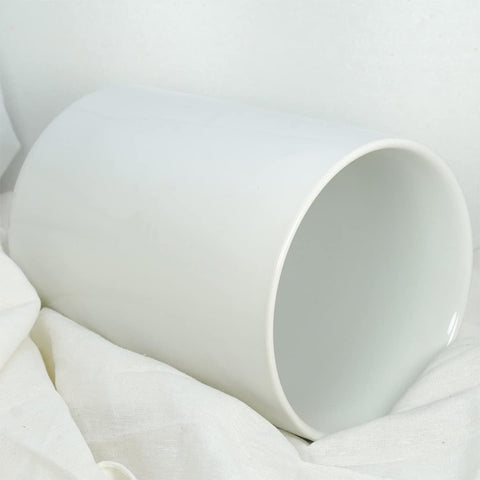 ALYC white ceramic jar on kitchen shelf complements modern décor while remaining practical.