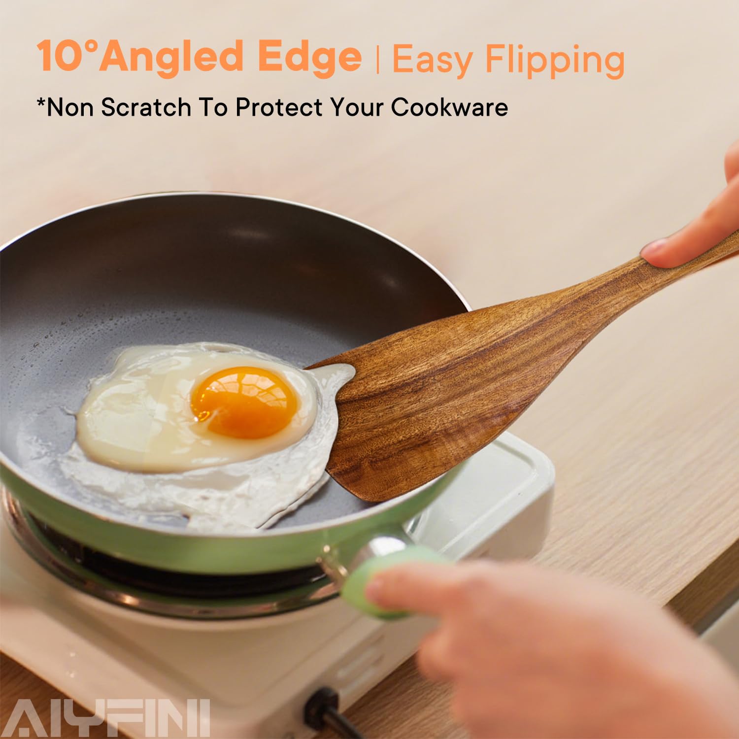 Alyfini acacia skinny spurtle helps stir and scrape narrow containers.