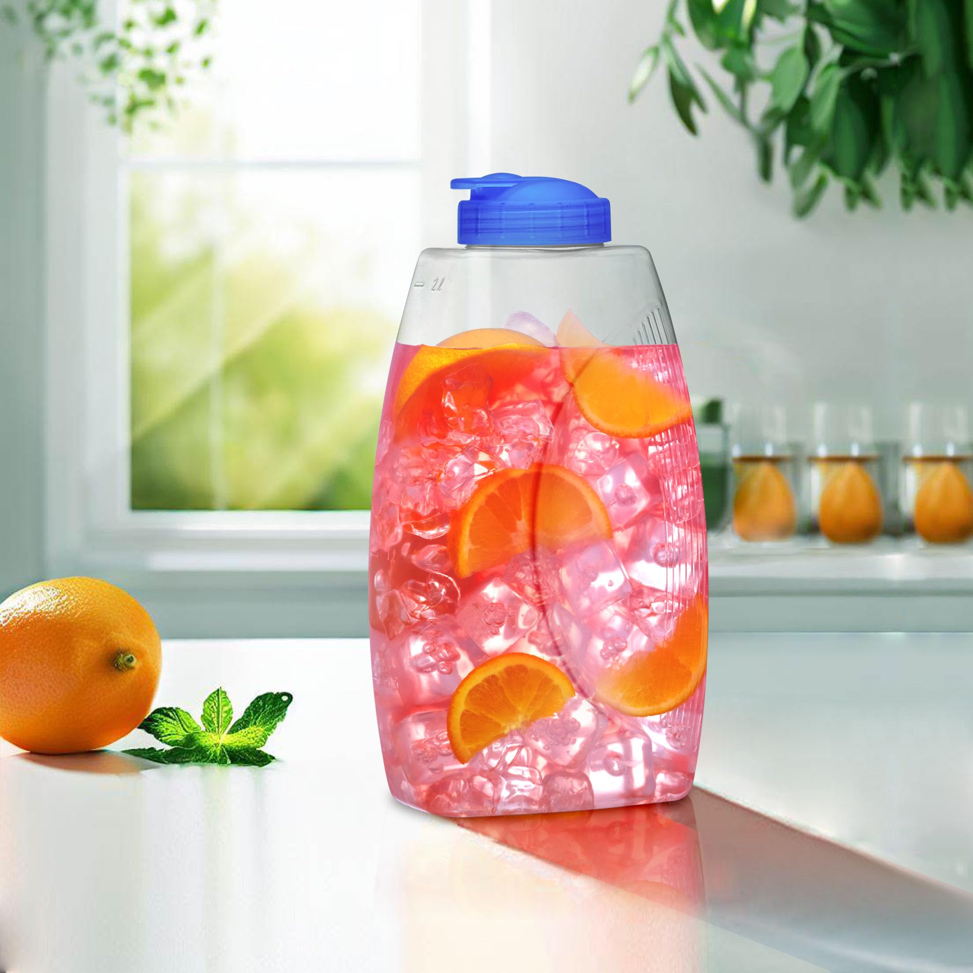 Amazing Abby Fitly 64oz Pitcher lid demonstrates secure pouring