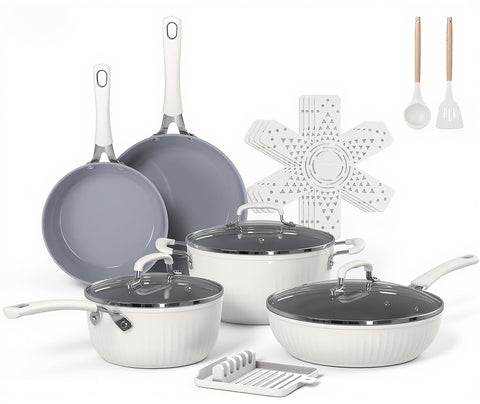 Ammeloo 15-piece ribbed ceramic cookware on stove, highlighting even heat distribution.