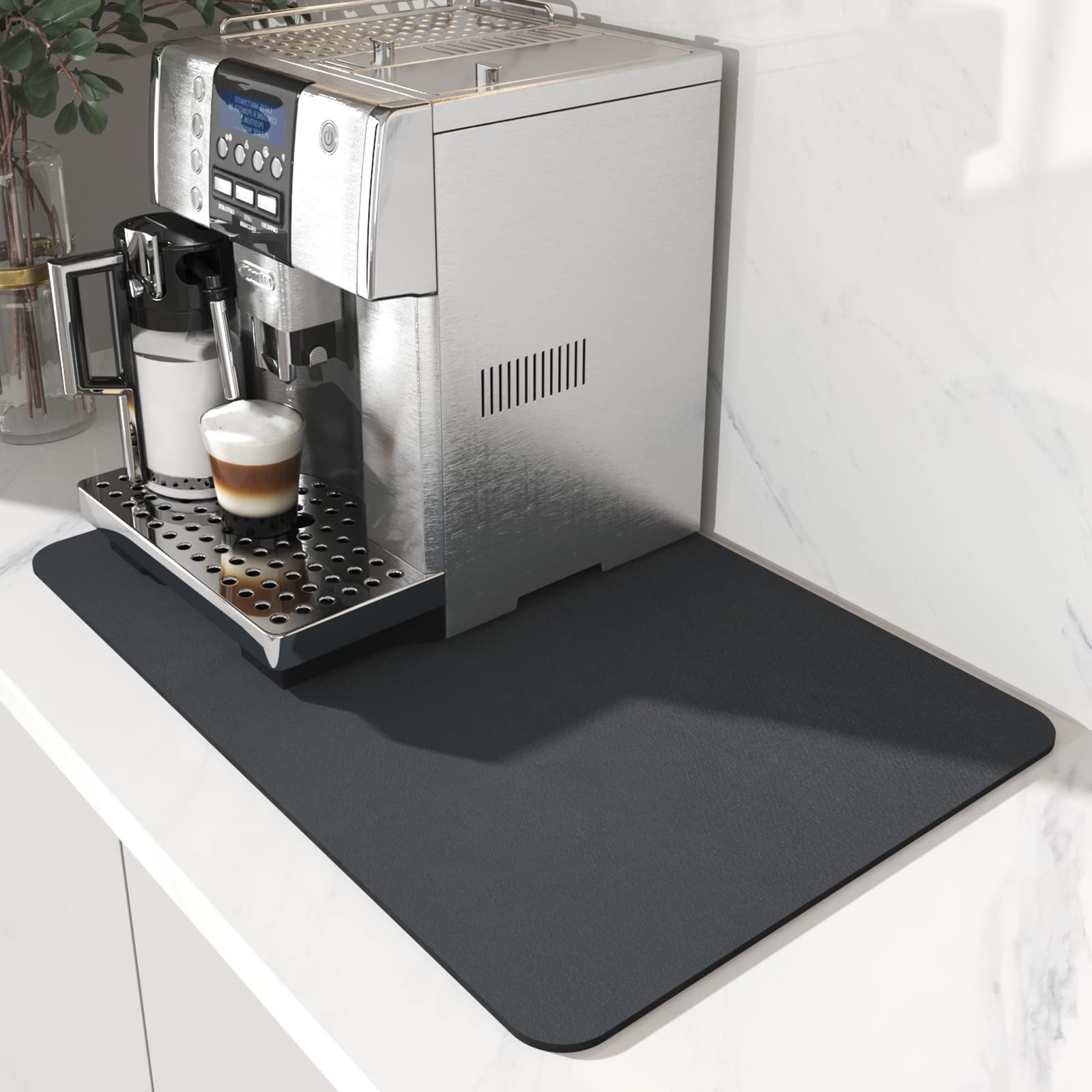 AMOAMI Coffee Mat sits under the coffee maker to keep counters clean and dry.