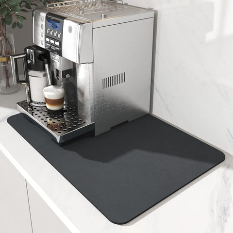 AMOAMI Coffee Mat sits under the coffee maker to keep counters clean and dry.