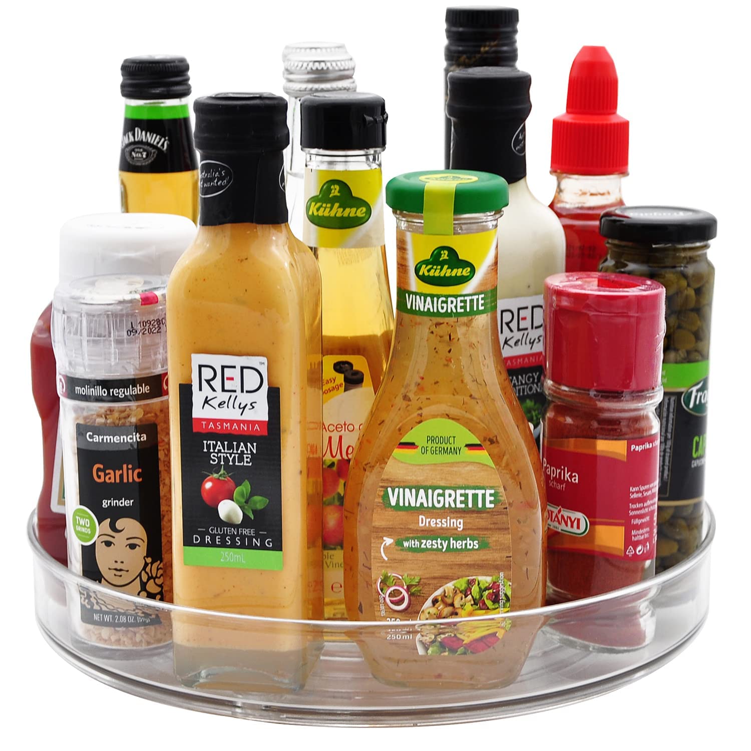 Amolliar 11-inch clear lazy Susan on kitchen counter for spices and condiments.