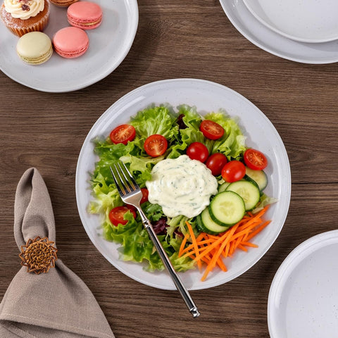 Rustic terracotta underside visible on AmorArc dinnerware