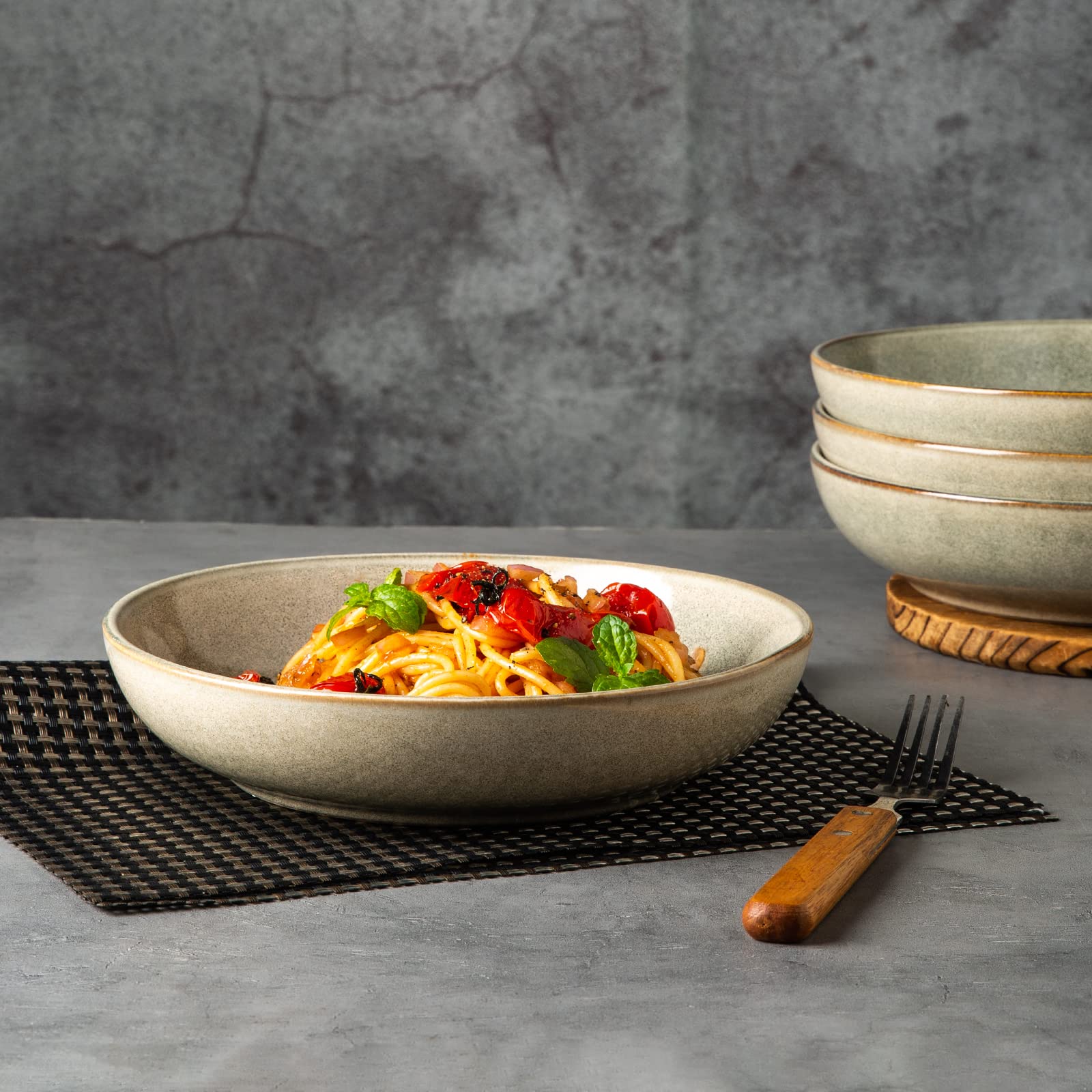 Table setting with AmorArc bowls and bright reactive glaze