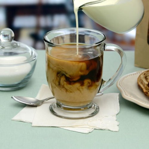 Anchor Hocking Cafe Mug with curved handle and flared lip for easy sipping.