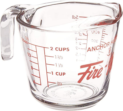 Anchor Hocking Fire-King 16 oz measuring cup with readable red measurements for precision cooking