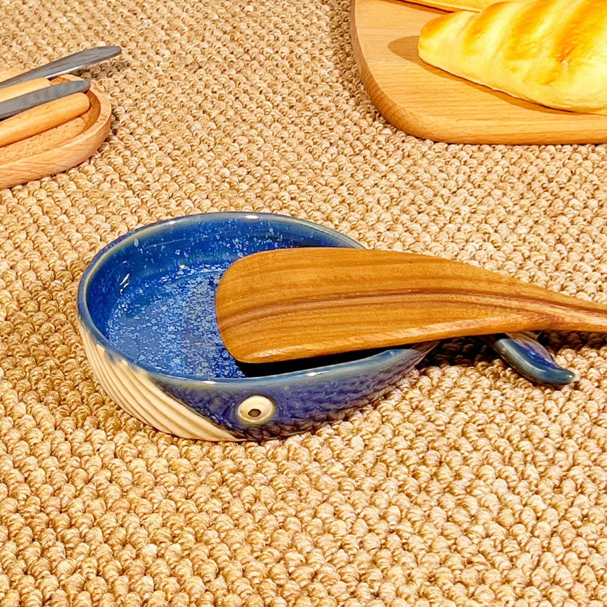 ANLYAWX ceramic whale spoon stand on counter catches drips for a tidy kitchen.
