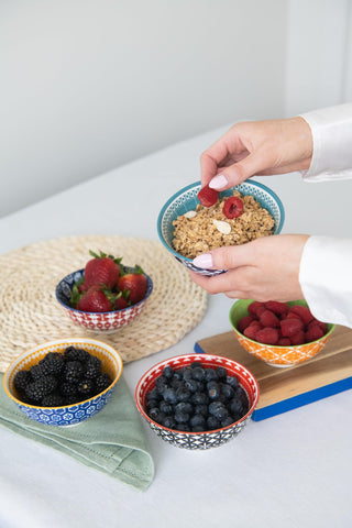 Annovero colorful bowls invite conversation at gatherings and meals.