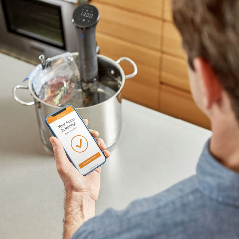 Anova Culinary Nano 2.0 with app control enabling hands-free sous vide cooking.