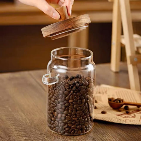 ANSQU bamboo spoon stored in loop for convenient scooping until empty.