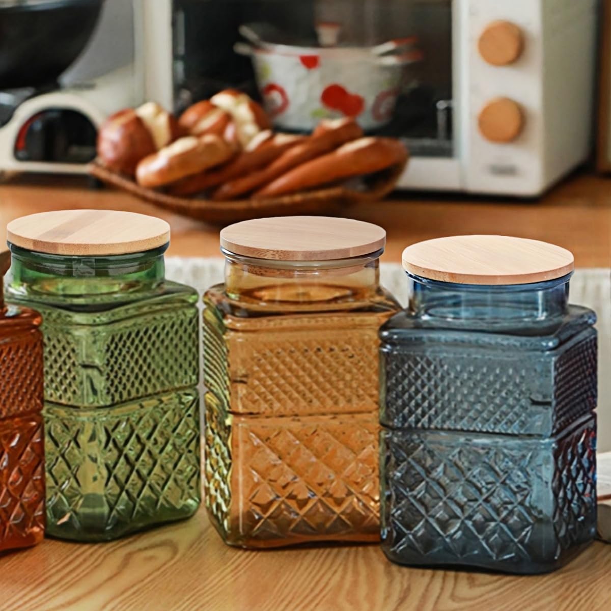 ANSQU decorative jar doubles as a vase for flowers.
