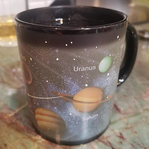 Antspirit holiday gift mug with a festive solar design for gifting.