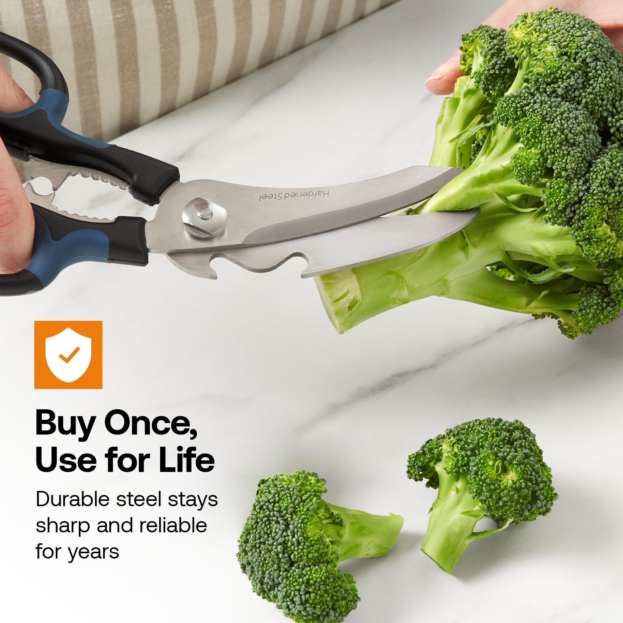 AnySharp 5-in-1 scissors cracking nuts and shells effortlessly