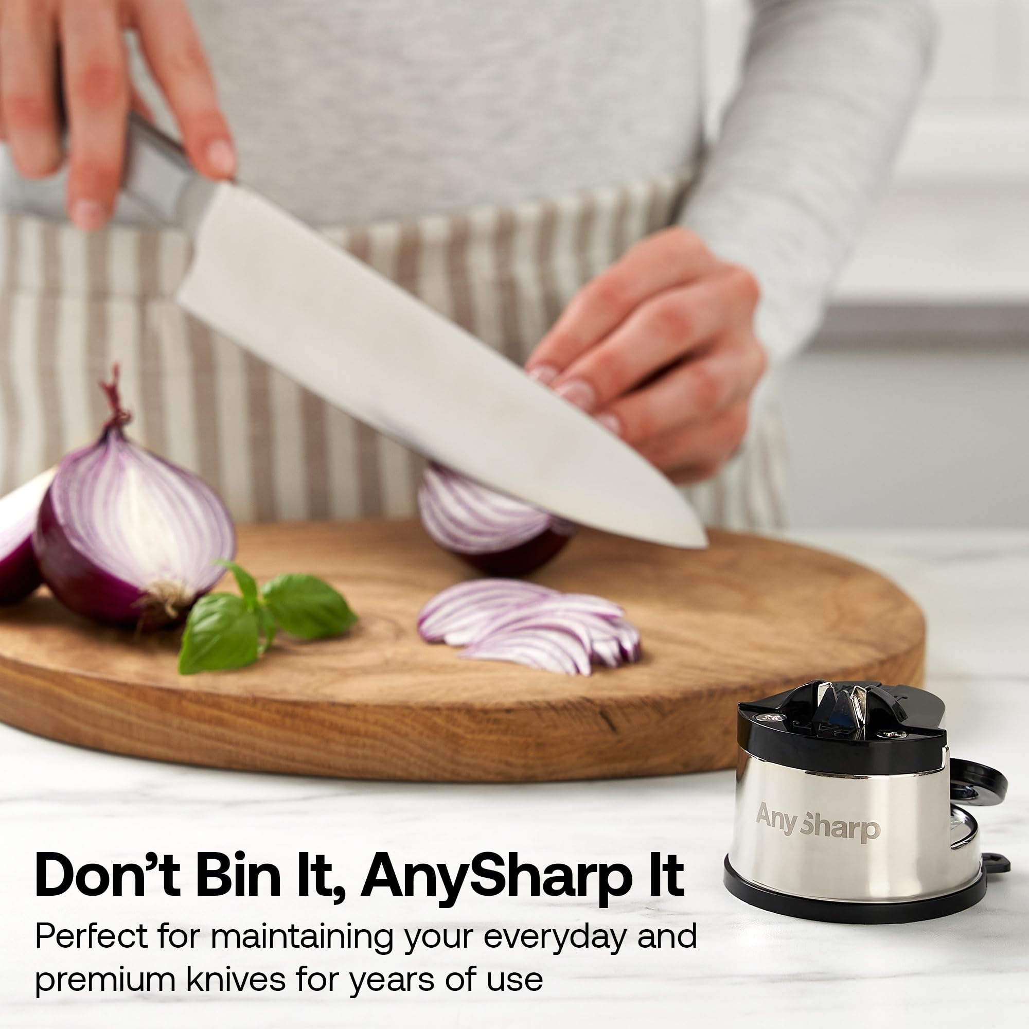 AnySharp Pro Metal Knife Sharpener sharpening a bread knife.