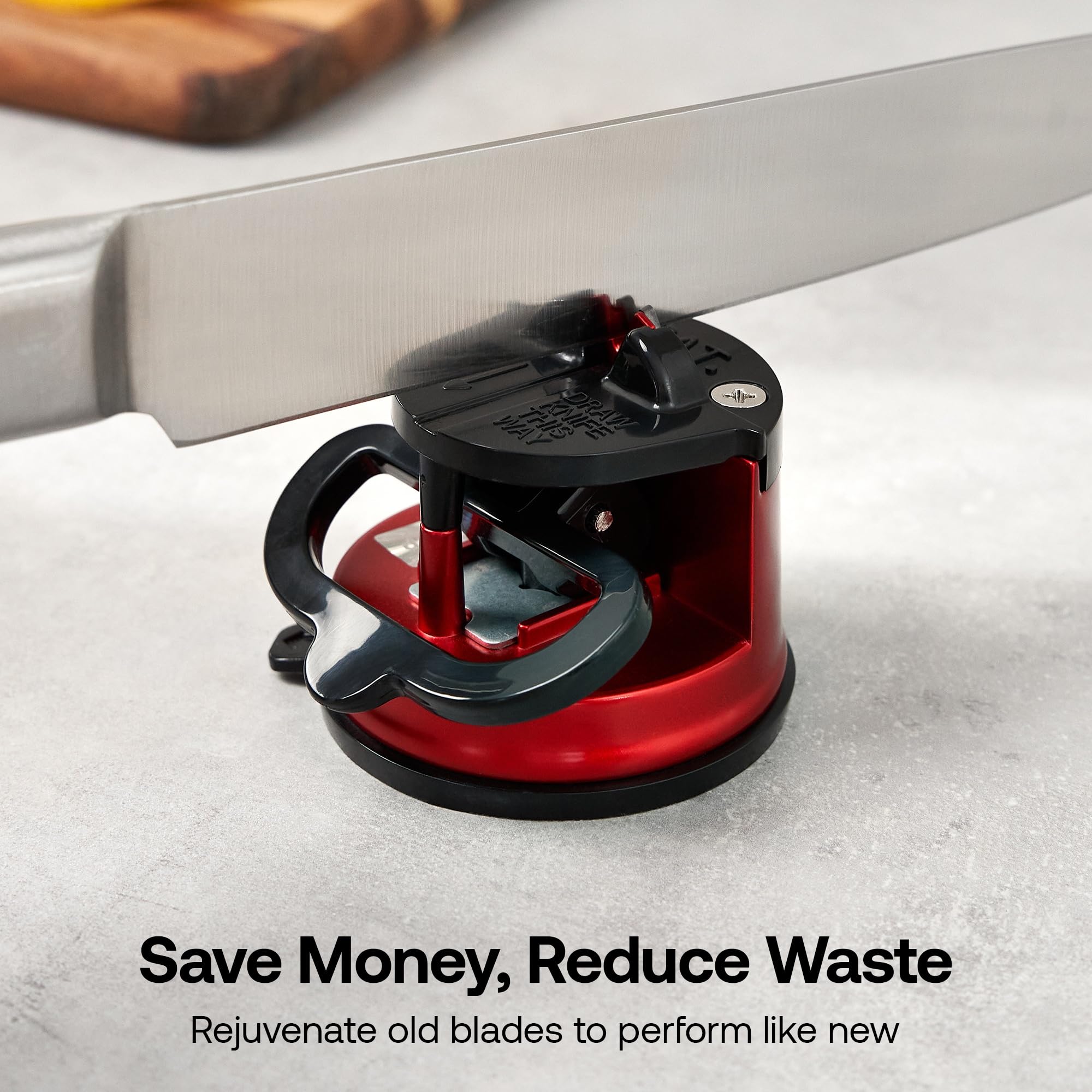 AnySharp PRO suction base mounted on counter for stable sharpening.
