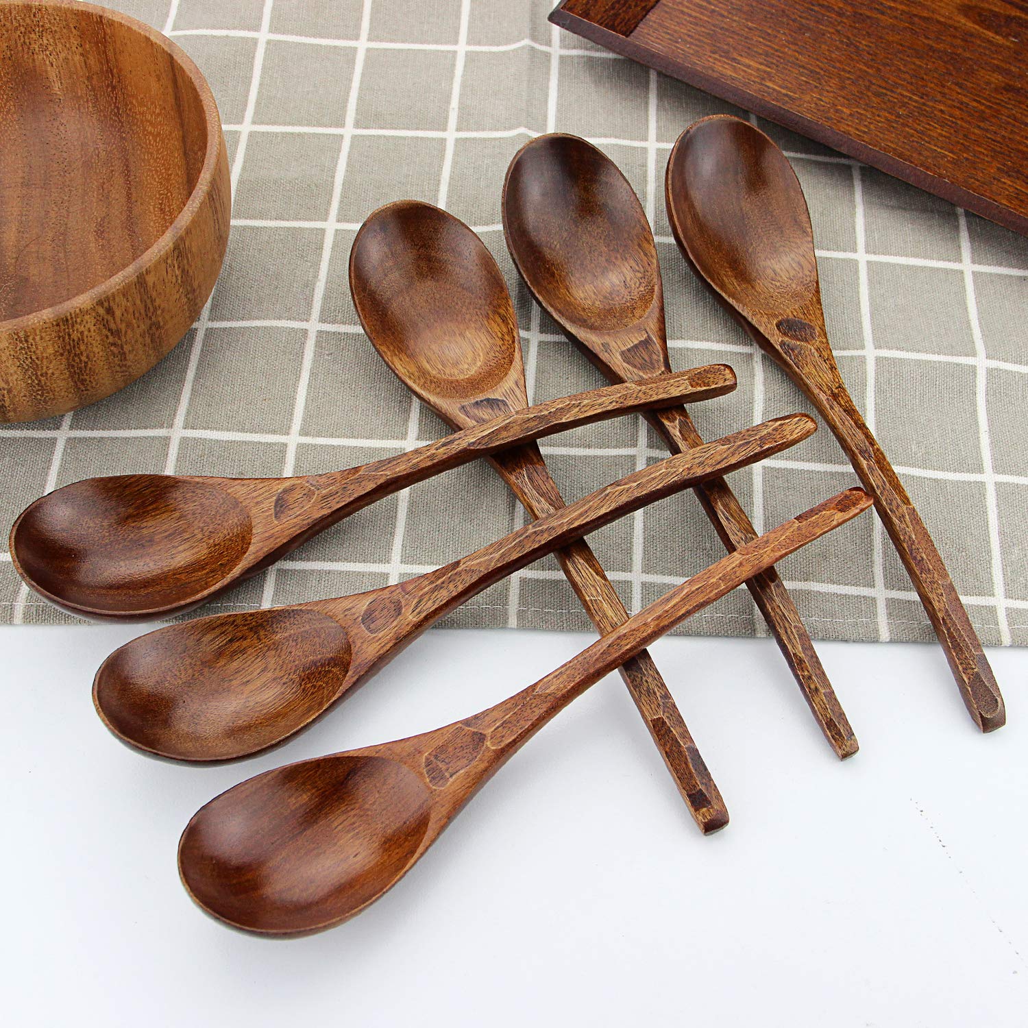AOOSY smooth finish wooden spoon adds refined touch to meals.