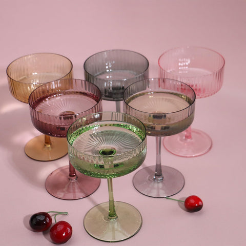 Close-up of color ripple detail on AOROTOE champagne coupe for visual appeal.