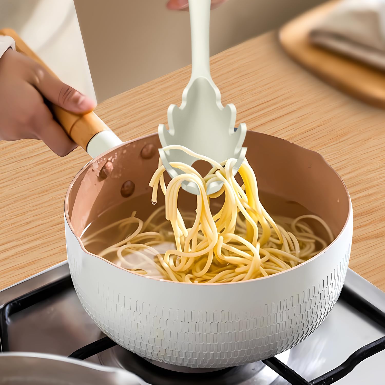 AOTHOD silicone slotted spoon ideal for draining liquids safely.