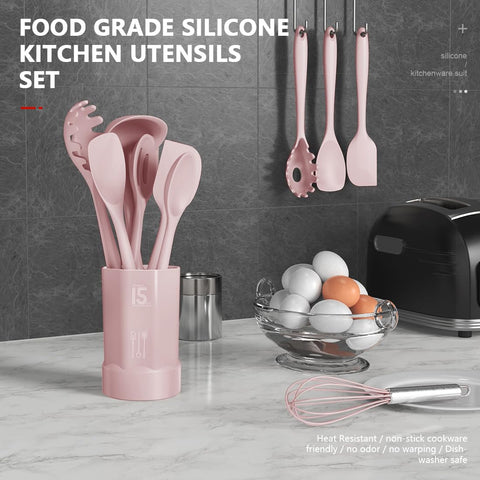 AOTHOD silicone spatula in pink for smooth flipping and stirring.