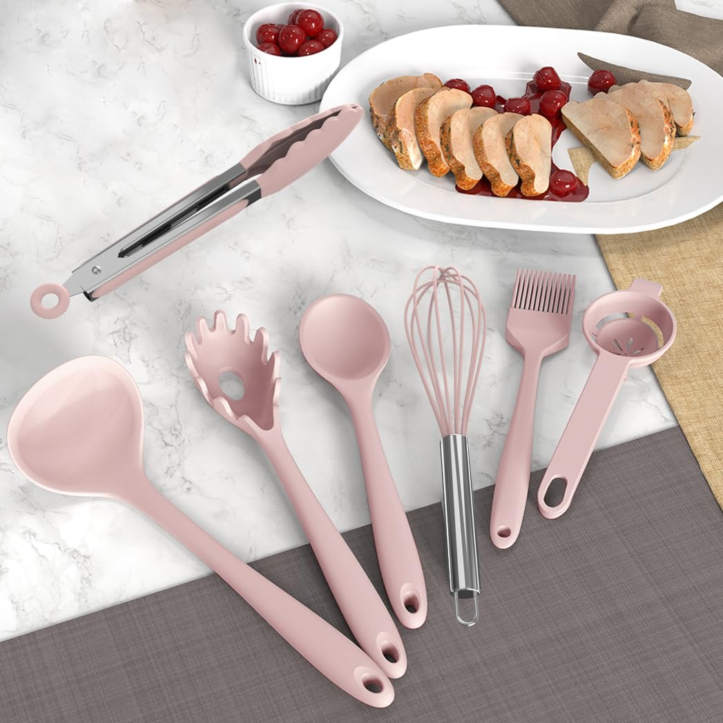 AOTHOD silicone turner in pink, ideal for turning and serving.