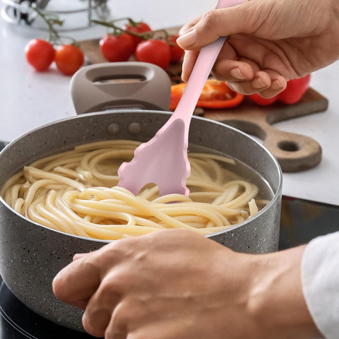 AOTHOD silicone whisk in pink for efficient mixing.