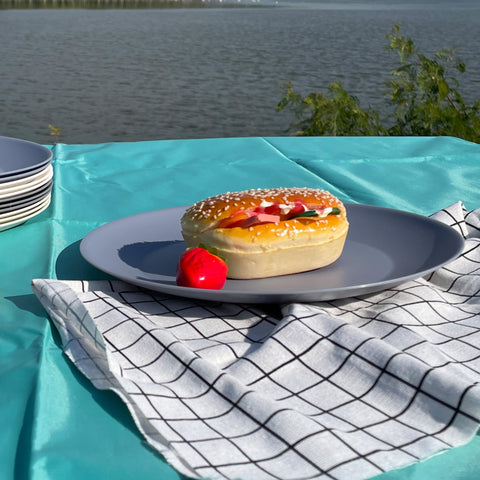 AOYITE stackable plates demonstrate space-saving design for compact storage.