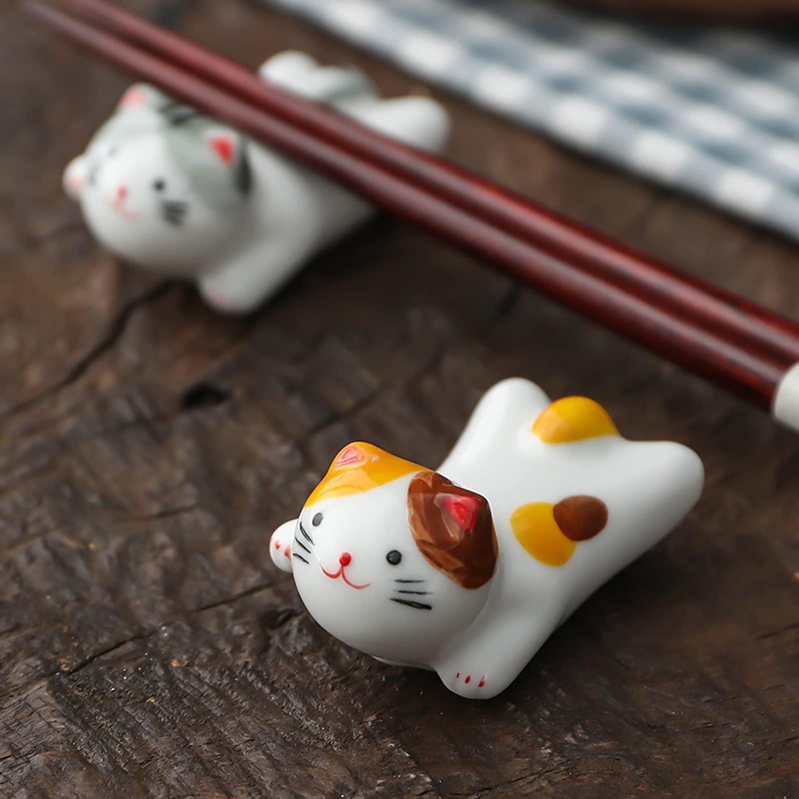 AP ARTSPER ceramic cat rest adds lucky cat charm to dining ambiance