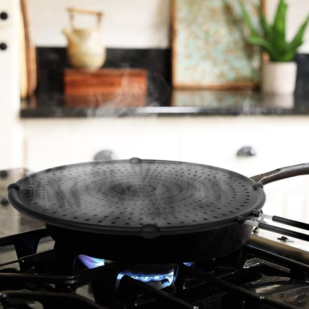 Apidgrowth silicone splatter screen covering a large pan while frying.
