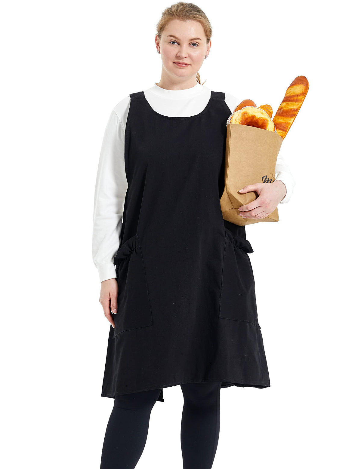 APRONNER cross-back plus-size linen apron with front pockets for secure storage during cooking.