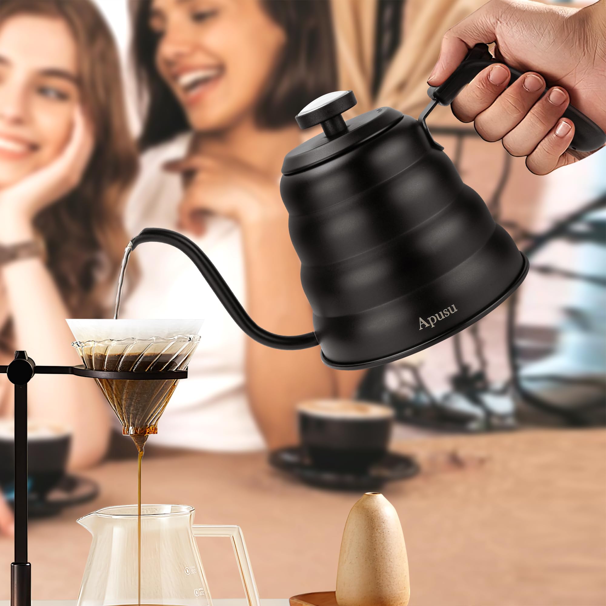 Apusu tea kettle thermometer and handle in use for safe, comfortable pouring