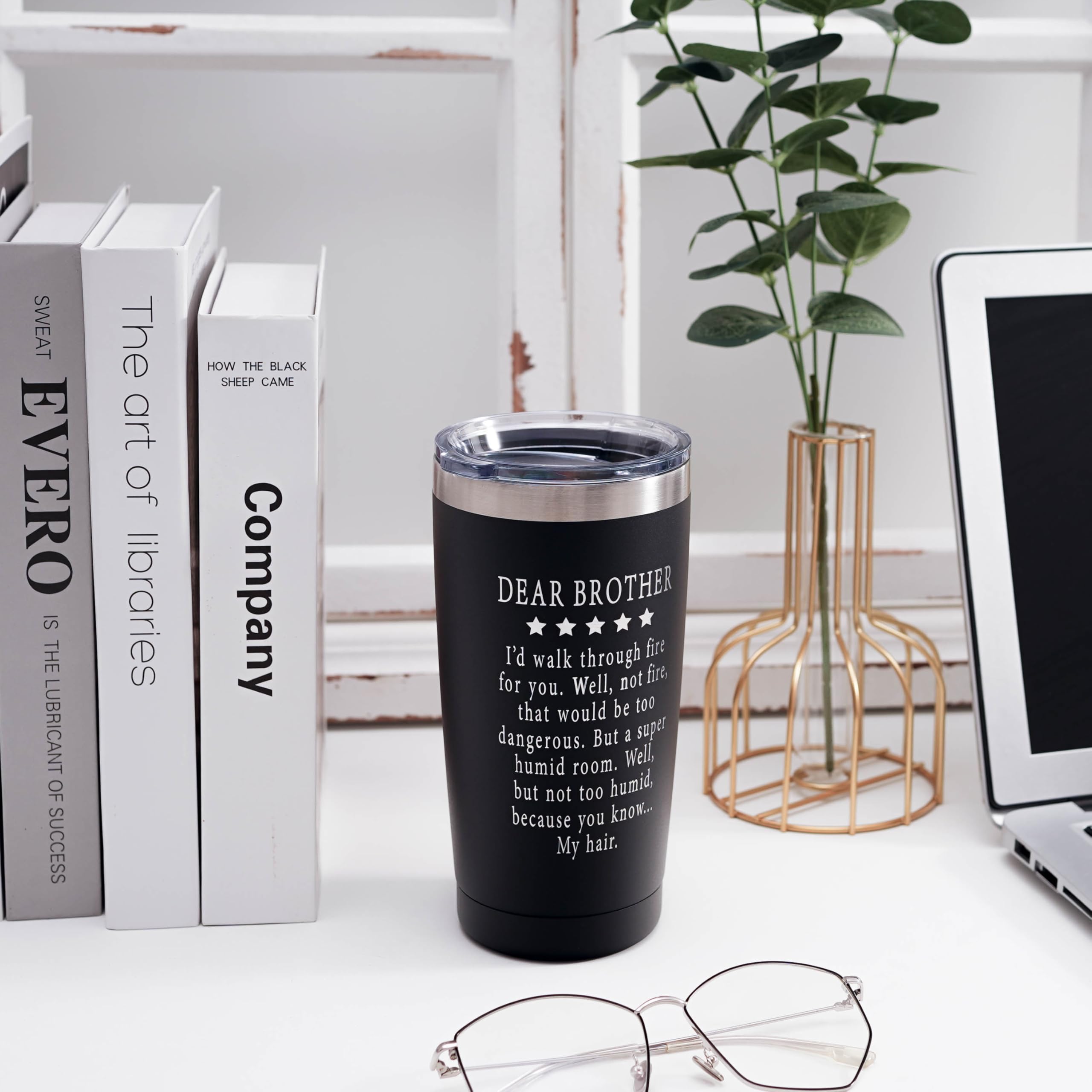 ARIABLE white elephant gift tumbler, a lighthearted desk companion during holidays.