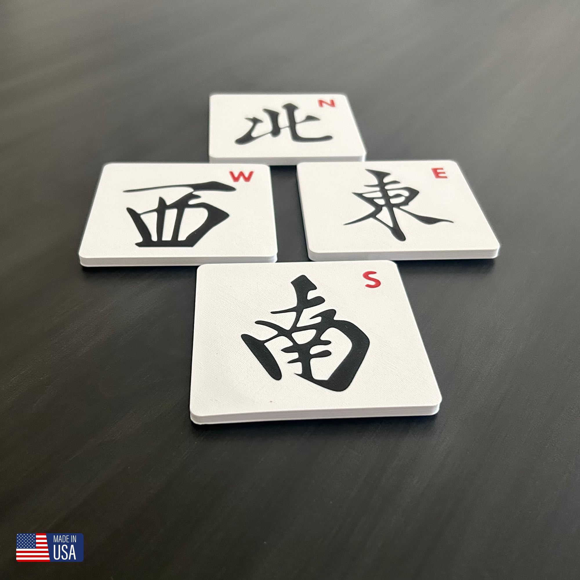 Artful 3D Mahjong East coaster protects surfaces during game night.