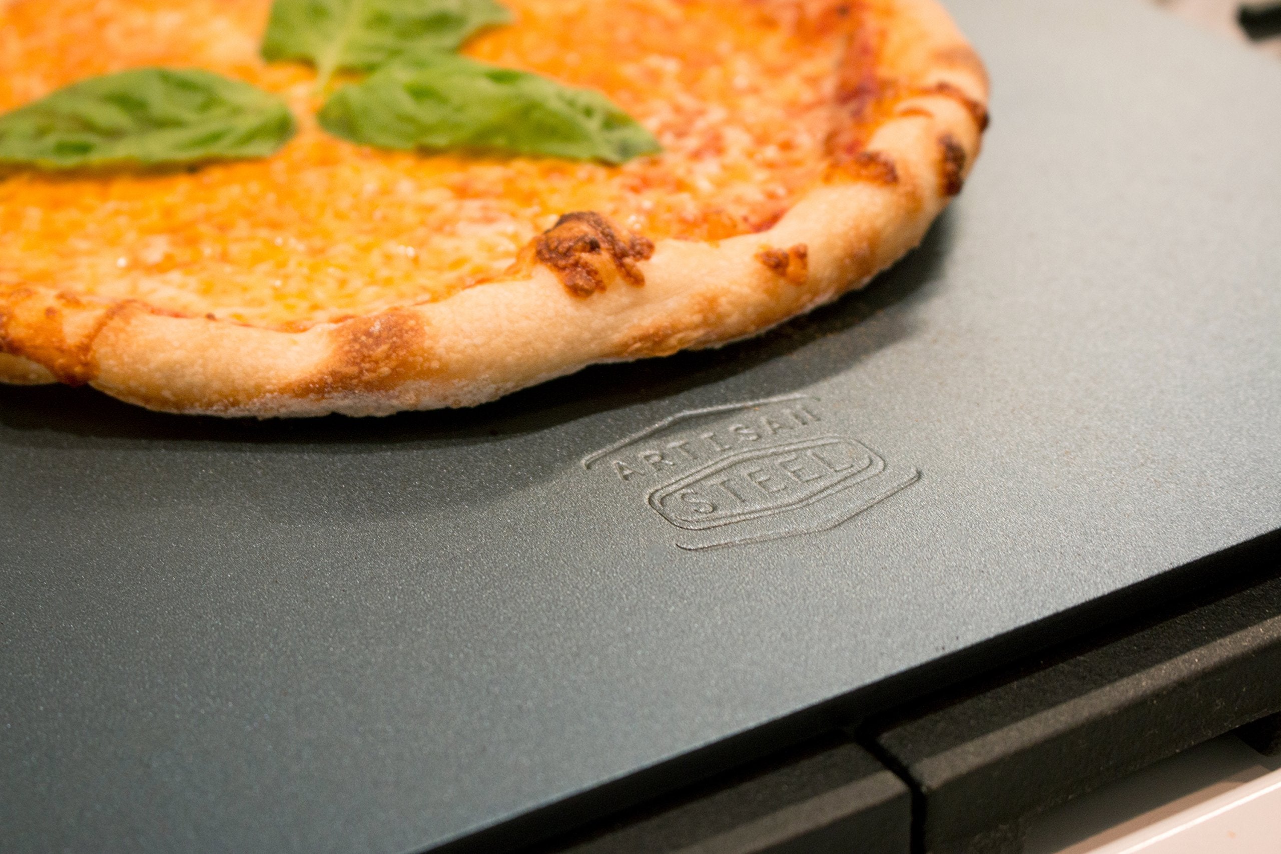 Artisan Steel 16x14 pizza steel, top view for ultra-crisp crust.