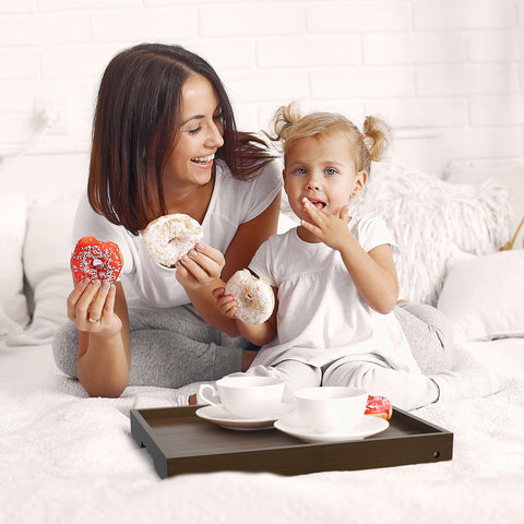Artmalle bamboo tray with groove edges and lip to prevent spills.