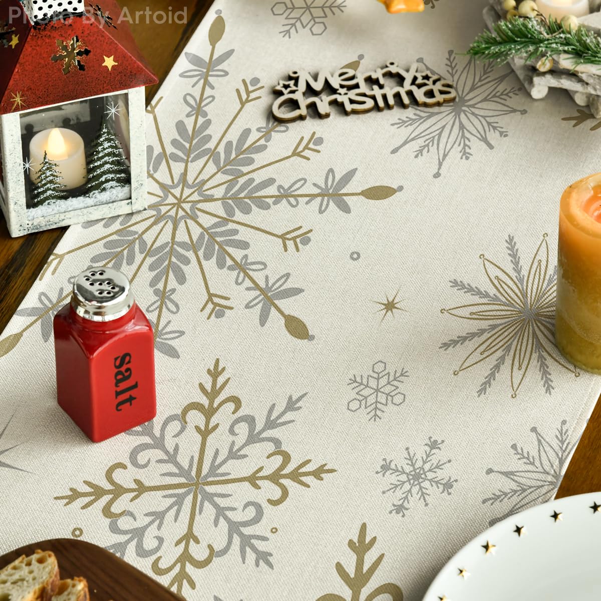 Artoid Mode beige snowflake table runner on a dining table for 6–8