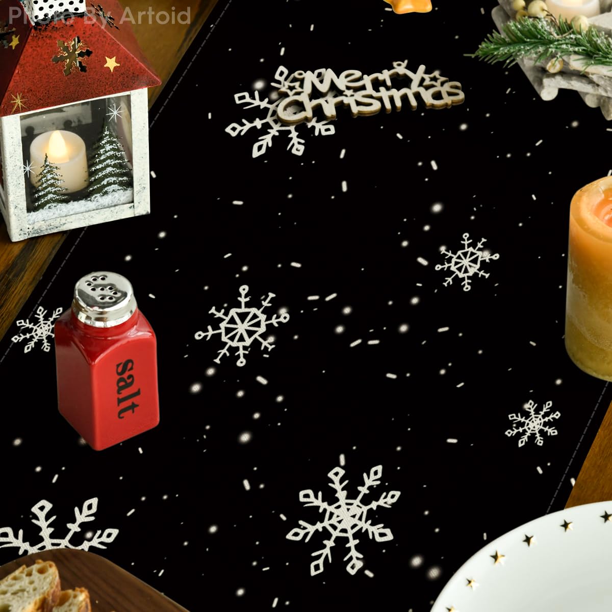 Artoid Mode snowman runner on dining table adds seasonal charm.