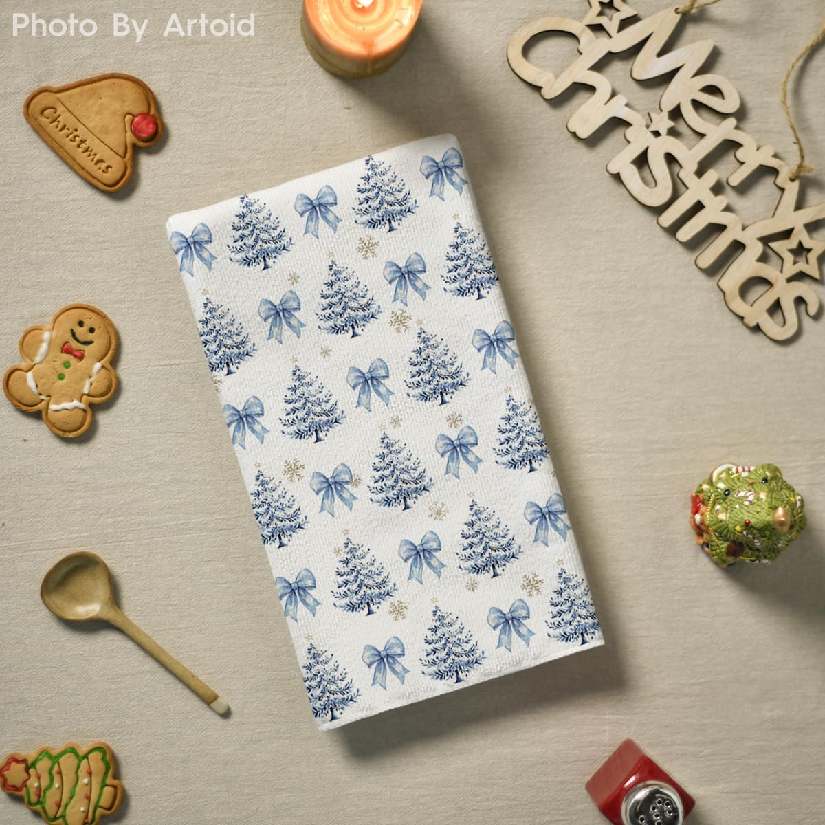 Artoid Mode Blue Bowknot towels winter decor on a cozy counter.